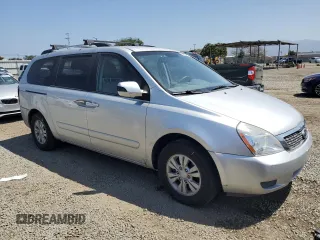 2012 Kia Sedona LX with VIN KNDMG4C72C6445242, listed as a Copart auction lot 54164455 with 143,124 mi miles and Salvage Title. Bid and sale history available at carsss.com. Image 4.