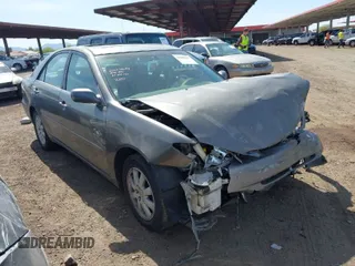 2004 Toyota Camry LE with VIN 4T1BF30K24U569209, listed as a IAAI auction lot 41988665 with 191,017 mi miles. Bid and sale history available at carsss.com. Image 1.