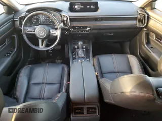 2023 Mazda CX-50 S Premium Plus with VIN 7MMVABEM3PN102285, listed as a Copart auction lot 77684064 with 14,190 mi miles and Salvage Title. Bid and sale history available at DreamBid. Image 8.