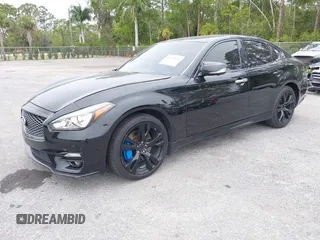 2015 Infiniti Q70 z VIN JN1BY1AR6FM561165, wystawiony jako IAAI lot #41622832 z przebiegiem 121 522 mil mil oraz . Historia ofert i sprzedaży dostępna na DreamBid. Obrazek 2.