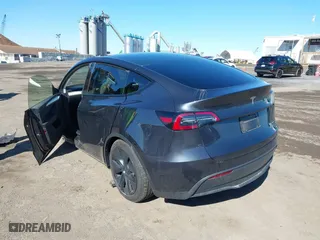 2025 Tesla Model Y Long Range with VIN 7SAYGDEE1SA351255, listed as a IAAI auction lot 41816235 with 1,463 mi miles. Bid and sale history available at carsss.com. Image 3.