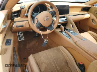 2024 Lexus LC 500h с VIN JTHMPAAY4RA110109, выставлен на аукционе Copart как лот 76007344 с пробегом Не указан миль и На запчасти • Non repairable. История ставок и продаж доступна на DreamBid. Изображение 8.