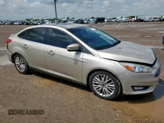 2018 Ford Focus Titanium z VIN 1FADP3J26JL279443, wystawiony jako Copart lot #58837435 z przebiegiem 136 538 mil mil oraz Szkoda całkowita • Salvage title. Historia ofert i sprzedaży dostępna na DreamBid. Obrazek 4.
