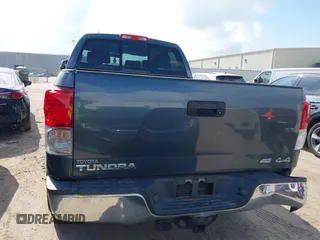 2010 Toyota Tundra z VIN 5TFUW5F13AX138105, wystawiony jako IAAI lot #41499018 z przebiegiem 295 414 mil mil oraz . Historia ofert i sprzedaży dostępna na DreamBid. Obrazek 17.