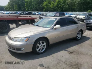 2001 Lexus ES 300 with VIN JT8BF28G815110687, listed as a Copart auction lot 63811545 with 73,587 mi miles and Salvage title. Bid and sale history available at DreamBid. Image 1.