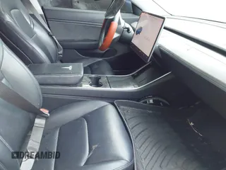 2018 Tesla Model 3 Long Range Battery with VIN 5YJ3E1EA2JF040914, listed as a IAAI auction lot 42120091 with 138,130 mi miles and . Bid and sale history available at DreamBid. Image 5.