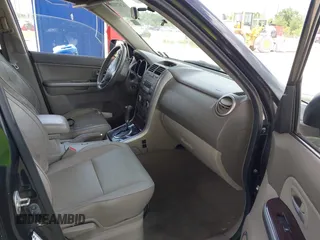 2006 Suzuki Grand Vitara Luxury z VIN JS3TD947664104590, wystawiony jako IAAI lot #42473110 z przebiegiem 146 715 mil mil oraz . Historia ofert i sprzedaży dostępna na DreamBid. Obrazek 5.