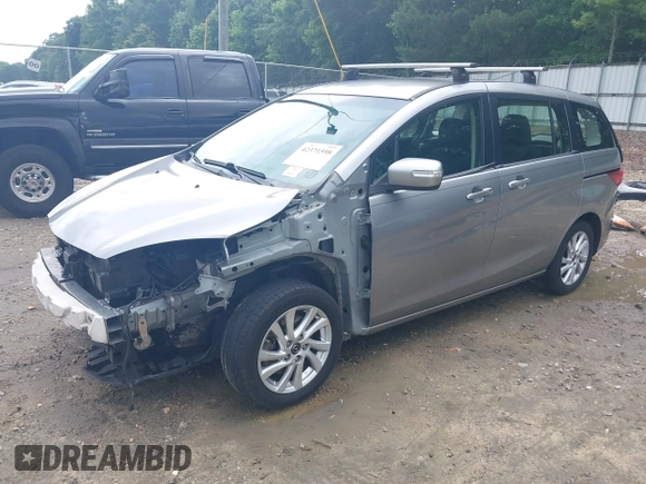 2013 Mazda 5 Sport z VIN JM1CW2BL7D0145413, wystawiony jako IAAI lot #42371598 z przebiegiem 222 115 mil mil oraz . Historia ofert i sprzedaży dostępna na DreamBid. Obrazek 2.