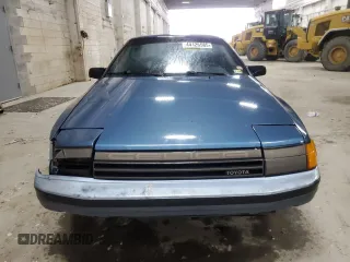 1987 Toyota Celica with VIN JT2ST67C3H7085589, listed as a Copart auction lot 44126585 with 81,830 mi miles and Salvage title. Bid and sale history available at DreamBid. Image 5.