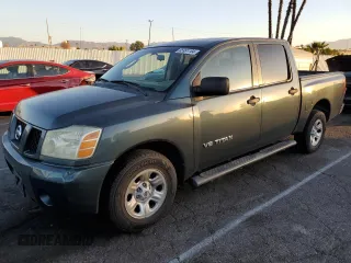 2005 Nissan Titan SE with VIN 1N6AA07A55N557591, listed as a Copart auction lot 85991164 with 176,809 mi miles and Salvage Title. Bid and sale history available at DreamBid. Image 1.