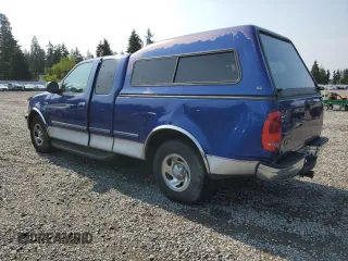 1998 Ford F-150 with VIN 1FTZX1765WKA33379, listed as a Copart auction lot 62009135 with 152,607 mi miles and Salvage title. Bid and sale history available at DreamBid. Image 2.