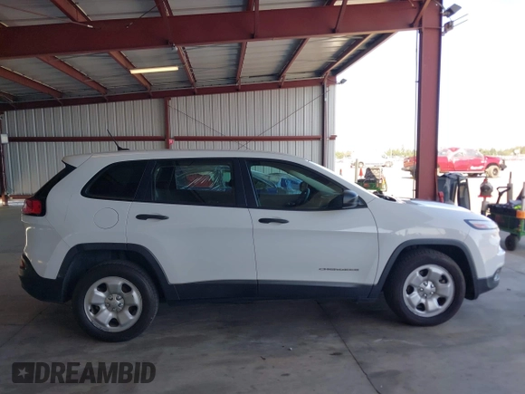 2015 Jeep Cherokee Sport z VIN 1C4PJLAB5FW560342, wystawiony jako IAAI lot #42422292 z przebiegiem 117 916 mil mil oraz . Historia ofert i sprzedaży dostępna na DreamBid. Obrazek 13.