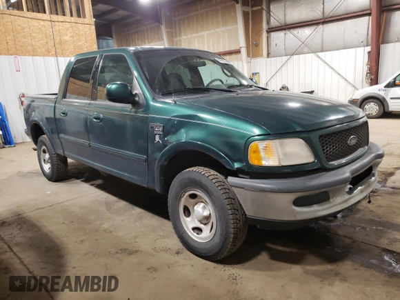 2001 Ford F-150 XLT with VIN 1FTRW08W41KD98737, listed as a Copart auction lot 64695065 with 179,158 mi miles and Clean title. Bid and sale history available at DreamBid. Image 4.