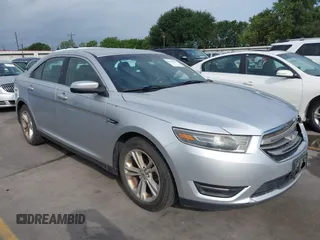 2015 Ford Taurus SEL z VIN 1FAHP2E88FG133328, wystawiony jako IAAI lot #42179649 z przebiegiem 127 171 mil mil oraz . Historia ofert i sprzedaży dostępna na DreamBid. Obrazek 1.