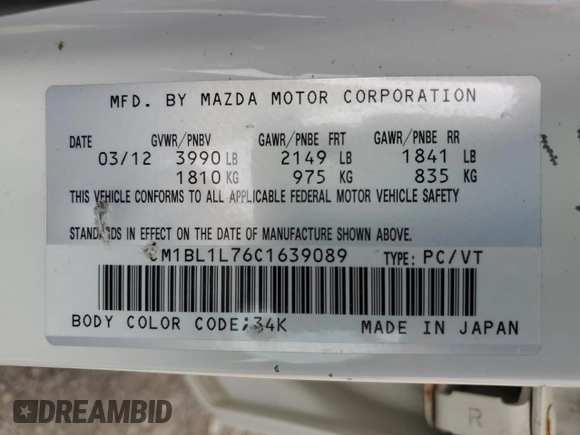 2012 Mazda 3 i Touring z VIN JM1BL1L76C1639089, wystawiony jako Copart lot #59891555 z przebiegiem 132 152 mil mil oraz Czysty tytuł • Clean title. Historia ofert i sprzedaży dostępna na DreamBid. Obrazek 12.
