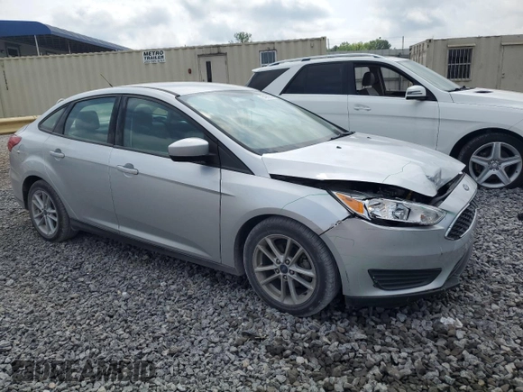 2018 Ford Focus SE z VIN 1FADP3F27JL250591, wystawiony jako Copart lot #54989245 z przebiegiem 85 838 mil mil oraz Szkoda całkowita • Salvage title. Historia ofert i sprzedaży dostępna na DreamBid. Obrazek 4.