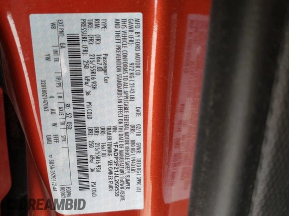 2018 Ford Focus SE z VIN 1FADP3F21JL269539, wystawiony jako Copart lot #51655945 z przebiegiem 88 133 mil mil oraz Szkoda całkowita • Salvage title. Historia ofert i sprzedaży dostępna na DreamBid. Obrazek 12.