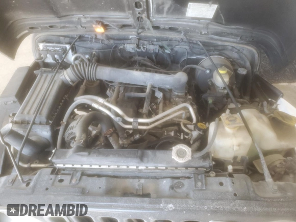 2004 Jeep Wrangler X with VIN 1J4FA39SX4P754012, listed as a Copart auction lot 45239915 with 160,473 mi miles and Salvage title. Bid and sale history available at DreamBid. Image 12.