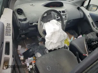 2009 Toyota Yaris with VIN JTDKT903095243922, listed as a Copart auction lot 51293545 with 196,909 mi miles and Salvage Title. Bid and sale history available at carsss.com. Image 8.