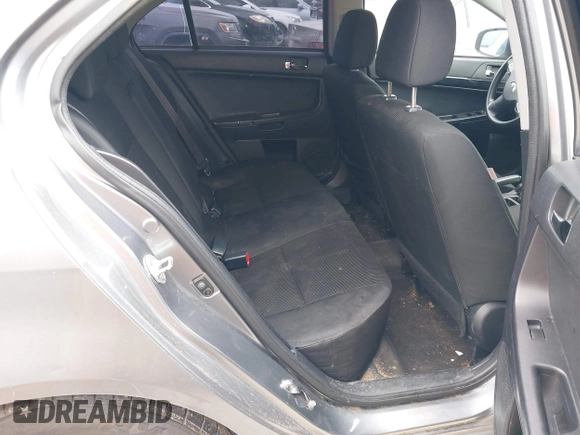 2016 Mitsubishi Lancer ES with VIN JA32U2FU4GU008977, listed as a IAAI auction lot 42139304 with 145,521 mi miles. Bid and sale history available at carsss.com. Image 8.