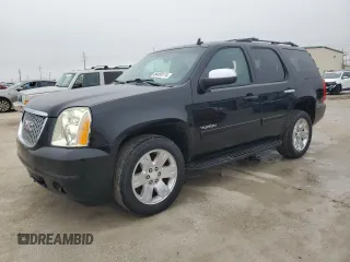 2012 GMC Yukon SLT with VIN 1GKS1CE04CR158460, listed as a Copart auction lot 84459174 with 153,662 mi miles and Salvage Title. Bid and sale history available at carsss.com. Image 1.