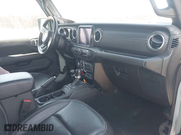 2023 Jeep Wrangler Sahara with VIN 1C4JJXP68PW627007, listed as a IAAI auction lot 42474745 with 57,912 mi miles and . Bid and sale history available at DreamBid. Image 5.
