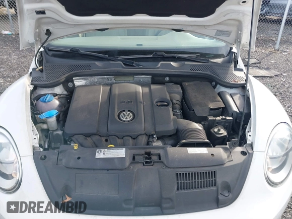 2014 Volkswagen Beetle 2.5L w/Sun with VIN 3VWJP7AT8EM611560, listed as a IAAI auction lot 41488488 with 140,798 mi miles and . Bid and sale history available at DreamBid. Image 10.