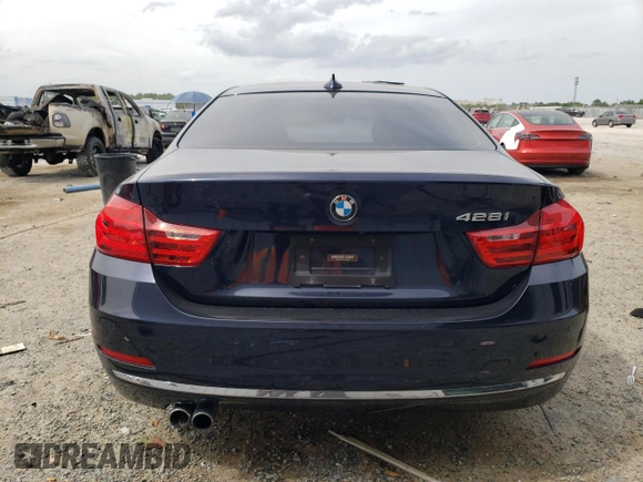 2016 BMW 4 Series 428i with VIN WBA3N7C52GK228544, listed as a Copart auction lot 53991705 with 103,218 mi miles and Salvage title. Bid and sale history available at DreamBid. Image 6.