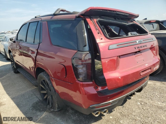 2022 Chevrolet Tahoe RST with VIN 1GNSKRKLXNR128058, listed as a Copart auction lot 76407744 with 0 mi miles and Salvage Title. Bid and sale history available at carsss.com. Image 2.