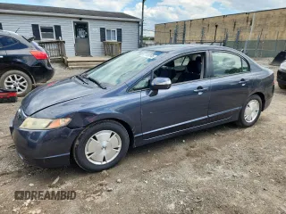 2006 Honda Civic z VIN JHMFA36266S012120, wystawiony jako Copart lot #57999145 z przebiegiem 146 565 mil mil oraz Nie do naprawy • Non repairable. Historia ofert i sprzedaży dostępna na DreamBid. Obrazek 1.