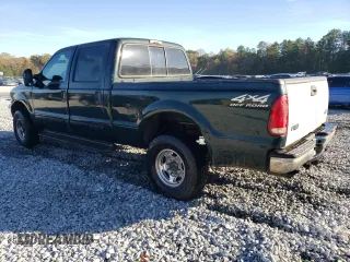 2001 Ford Super Duty F-250 XL with VIN 1FTNW21SX1EA33933, listed as a Copart auction lot 81153254 with 670,845 mi miles and Salvage Title. Bid and sale history available at carsss.com. Image 2.