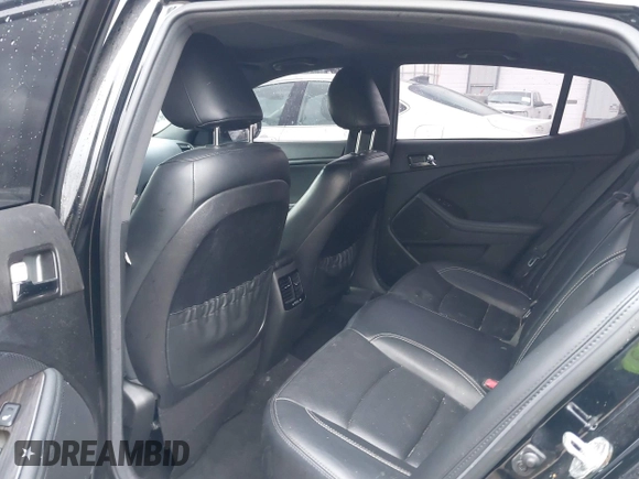 2013 Kia Optima SX with VIN 5XXGR4A65DG218034, listed as a IAAI auction lot 42027756 with 100,285 mi miles and . Bid and sale history available at DreamBid. Image 8.