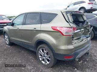 2013 Ford Escape SEL with VIN 1FMCU9H9XDUB61880, listed as a IAAI auction lot 42271136 with 115,837 mi miles and . Bid and sale history available at DreamBid. Image 3.