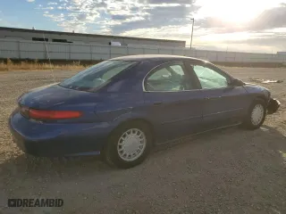 1996 Mercury Sable GS with VIN 1MELM50U3TA659219, listed as a Copart auction lot 74373944 with 156,398 mi miles and Salvage Title. Bid and sale history available at carsss.com. Image 3.