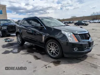 2014 Cadillac SRX Premium Collection z VIN 3GYFNGE34ES676646, wystawiony jako Copart lot #53478695 z przebiegiem 115 096 mil mil oraz Szkoda całkowita • Salvage title. Historia ofert i sprzedaży dostępna na DreamBid. Obrazek 14.
