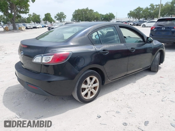 2011 Mazda Mazda3 i Touring with VIN JM1BL1VFXB1472772, listed as a IAAI auction lot 42180030 with 128,438 mi miles. Bid and sale history available at carsss.com. Image 4.