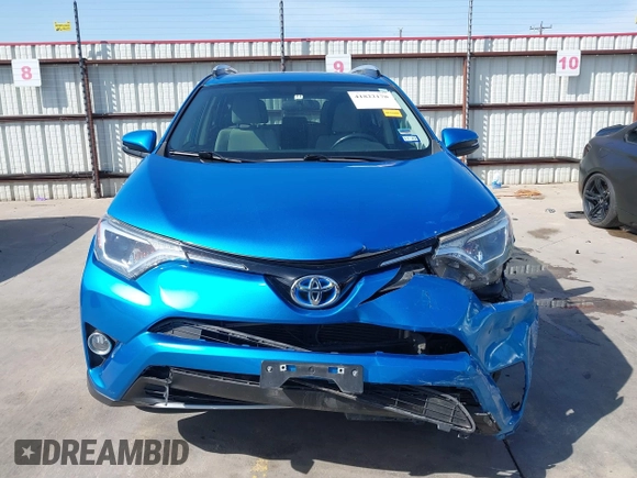 2016 Toyota RAV4 Hybrid XLE with VIN JTMRJREV5GD014170, listed as a IAAI auction lot 41822178 with 89,676 mi miles. Bid and sale history available at carsss.com. Image 12.