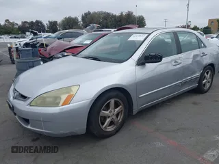 2003 Honda Accord EX z VIN JHMCM56673C058909, wystawiony jako IAAI lot #42458833 z przebiegiem 164 589 mil mil oraz . Historia ofert i sprzedaży dostępna na DreamBid. Obrazek 2.