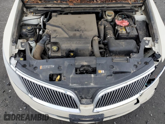 2014 Lincoln MKS EcoBoost с VIN 1LNHL9FT7EG601089, выставлен на аукционе Copart как лот 49483605 с пробегом 121 709 миль миль и Списание • Salvage title. История ставок и продаж доступна на DreamBid. Изображение 11.
