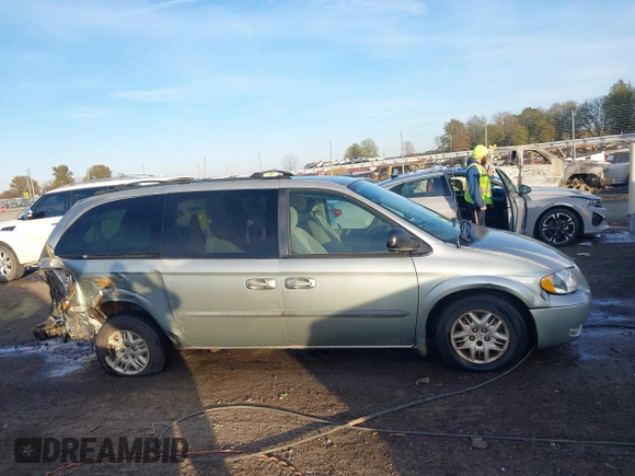 2003 Dodge Grand Caravan with VIN 2D4GP443X3R277421, listed as a IAAI auction lot 41035290 with 243,568 mi miles and . Bid and sale history available at DreamBid. Image 13.