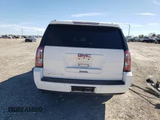 2015 GMC Yukon XL SLE z VIN 1GKS1GKC1FR643293, wystawiony jako Copart lot #82106544 z przebiegiem 164 623 mil mil oraz Szkoda całkowita • Salvage title. Historia ofert i sprzedaży dostępna na DreamBid. Obrazek 6.