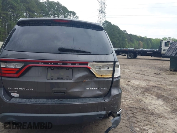 2014 Dodge Durango Citadel with VIN 1C4RDJEG1EC530474, listed as a IAAI auction lot 41961801 with 165,625 mi miles and . Bid and sale history available at DreamBid. Image 6.