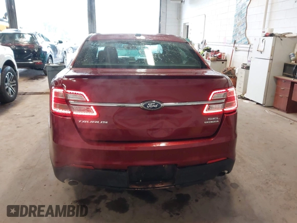 2015 Ford Taurus SEL with VIN 1FAHP2E82FG124009, listed as a IAAI auction lot 42323744 with 159,196 mi miles and . Bid and sale history available at DreamBid. Image 16.