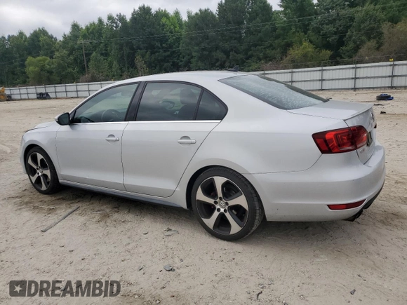 2013 Volkswagen Jetta with VIN 3VW5S7AJ5DM307972, listed as a Copart auction lot 62768225 with 164,118 mi miles and Salvage title. Bid and sale history available at DreamBid. Image 2.