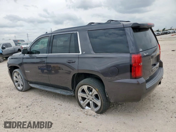 2016 Chevrolet Tahoe LT with VIN 1GNSKBKC5GR435051, listed as a Copart auction lot 57358325 with 171,241 mi miles and Salvage title. Bid and sale history available at DreamBid. Image 2.