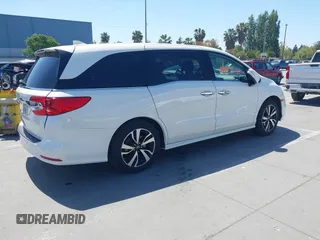 2018 Honda Odyssey Elite with VIN 5FNRL6H92JB005420, listed as a IAAI auction lot 42193696 with 78,623 mi miles and . Bid and sale history available at DreamBid. Image 4.