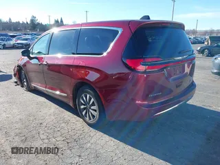 2023 Chrysler Pacifica Hybrid Limited with VIN 2C4RC1S7XPR518695, listed as a IAAI auction lot 41301401 with 24,433 mi miles and . Bid and sale history available at DreamBid. Image 3.