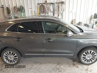 2018 Lincoln MKC Reserve with VIN 5LMCJ3D96JUL14629, listed as a IAAI auction lot 42595730 with 89,587 mi miles and . Bid and sale history available at DreamBid. Image 13.