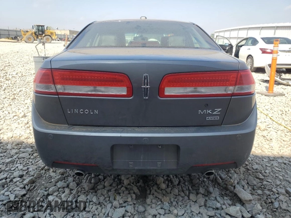 2012 Lincoln MKZ z VIN 3LNHL2JC9CR830958, wystawiony jako Copart lot #56486485 z przebiegiem 205 402 mil mil oraz Nie do naprawy • Non repairable. Historia ofert i sprzedaży dostępna na DreamBid. Obrazek 6.
