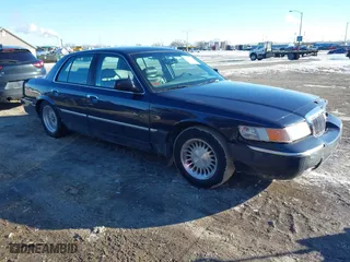 2002 Mercury Grand Marquis LS Premium with VIN 2MEFM75WX2X602511, listed as a IAAI auction lot 41379754 with 164,582 mi miles. Bid and sale history available at carsss.com. Image 1.